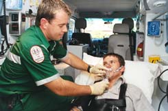 Ambulance Paramedic treating a patient